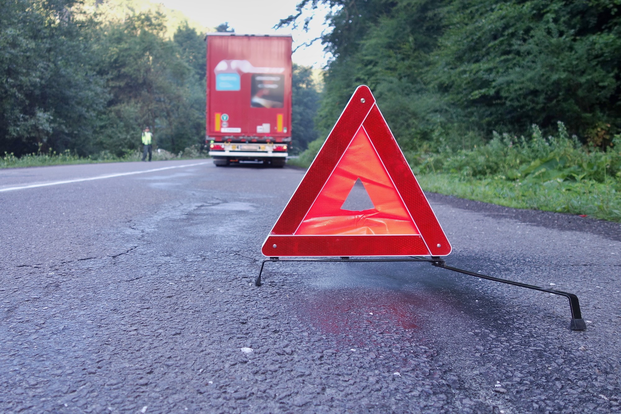 Red Warning Triangle on a Road